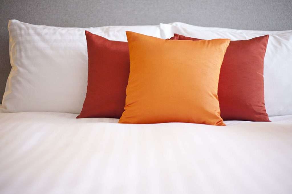 Colorful Pillow on a bed