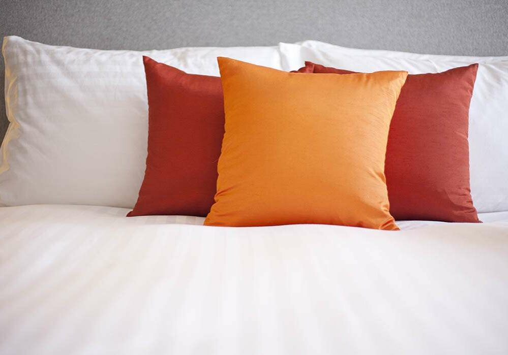 Colorful Pillow on a bed